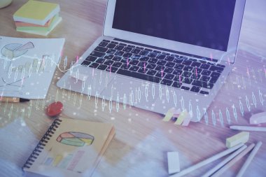 Arka planda eski pazar grafik hologramı ve kişisel bilgisayar var. Çoklu maruz kalma. Yatırım kavramı.