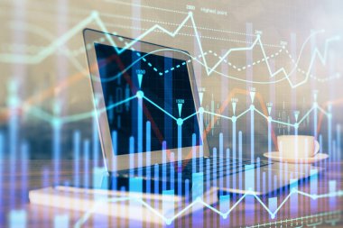 Arka planda eski pazar grafik hologramı ve kişisel bilgisayar var. Çifte maruziyet. Yatırım kavramı.