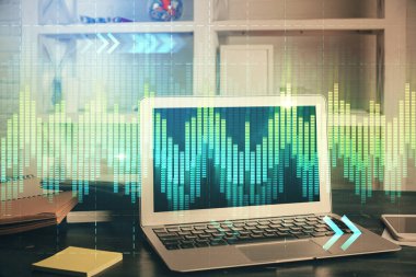 Finansal grafik renkli çizimler ve arka planda bilgisayar olan tablolar. Çifte maruziyet. Uluslararası pazarlar kavramı.