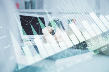 Finansal grafik WOMANS el notları arka plan alarak görüntülenir. Araştırma kavramı. Çift Pozlama