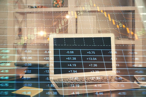 Financiële grafiek kleurrijke tekening en tabel met computer op de achtergrond. Dubbele belichting. Begrip internationale markten. — Stockfoto