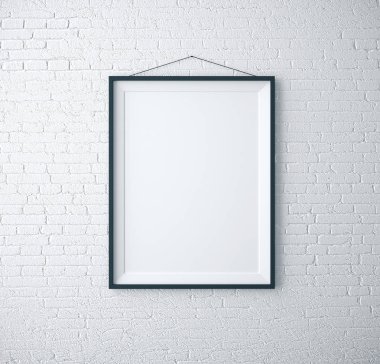 Beyaz tuğla odada boş çerçeve