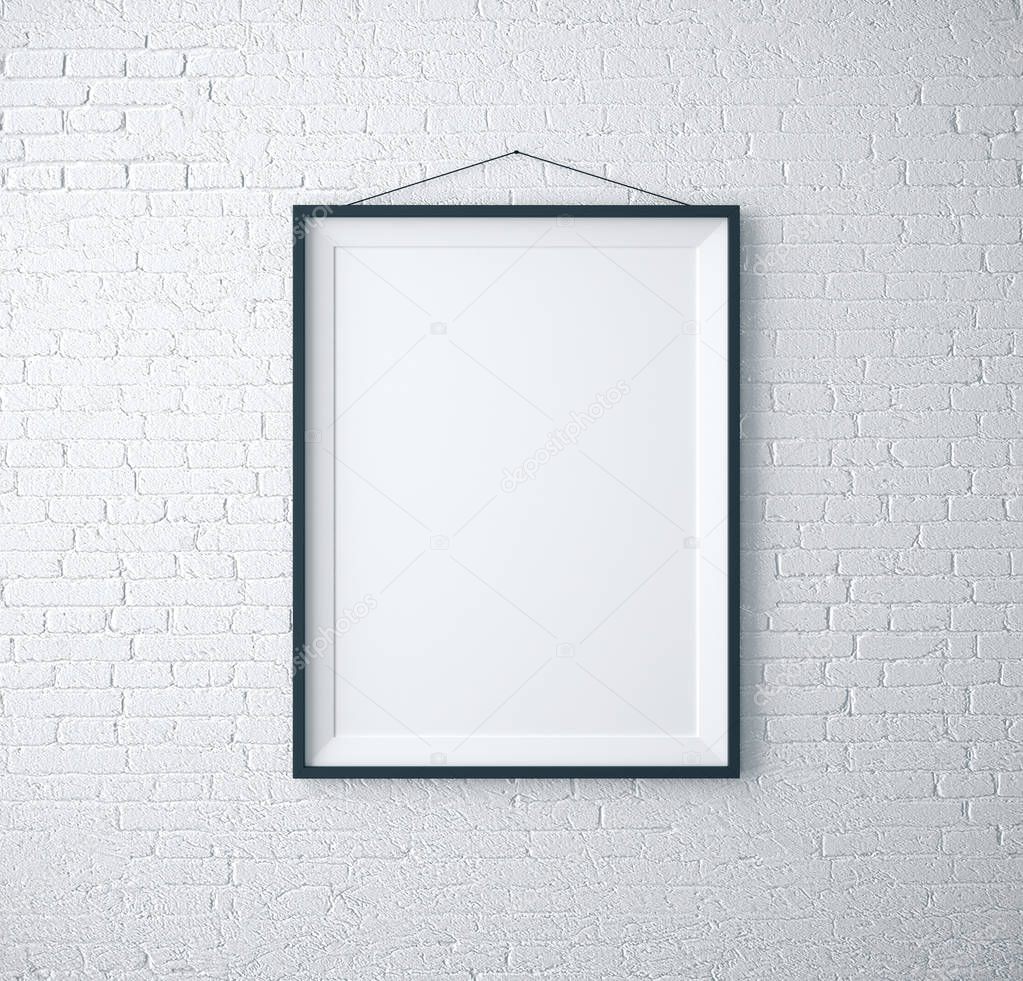 Empty frame on white brick room
