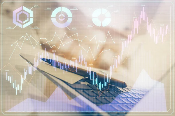 Financiële grafiek tekening en tabel met computer op de achtergrond. Dubbele belichting. Begrip internationale markten. — Stockfoto