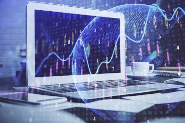 Forx çizelgesine ve bilgisayarla çalışma alanına çift pozlama. Uluslararası çevrimiçi ticaret kavramı.