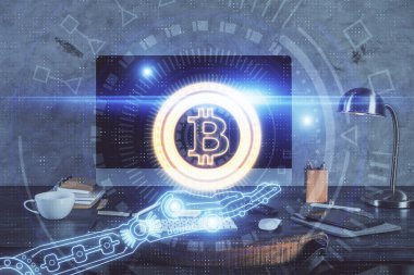 Engelleme zinciri ve kripto ekonomi temalı hologram ve bilgisayar geçmişi olan bir masa. Bitcoin kripto para kavramı.