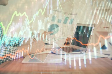 Adam ile mali grafik çift pozlama arka planda ofiste çalışır. Analiz kavramı.