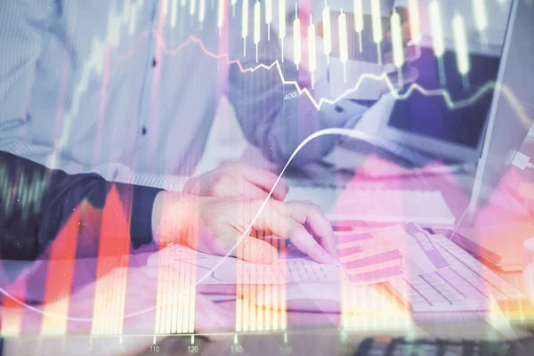 Multi exposure of chart with man typing on computer in office on background. Concept of hard work. — Stock Photo, Image