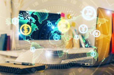 Finansal grafik renkli çizimler ve arka planda bilgisayar olan tablolar. Çifte maruziyet. Uluslararası pazarlar kavramı.