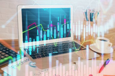 Kişisel bilgisayar arkaplanına çizilmiş borsa hologramı. Çifte maruziyet. Yatırım kavramı.