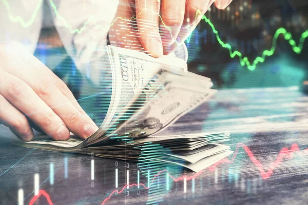 Multi esposizione del grafico del forex che disegna l'ologramma e le fatture e le mani dei dollari degli Stati Uniti. Concetto analisi tecnica. — Foto Stock