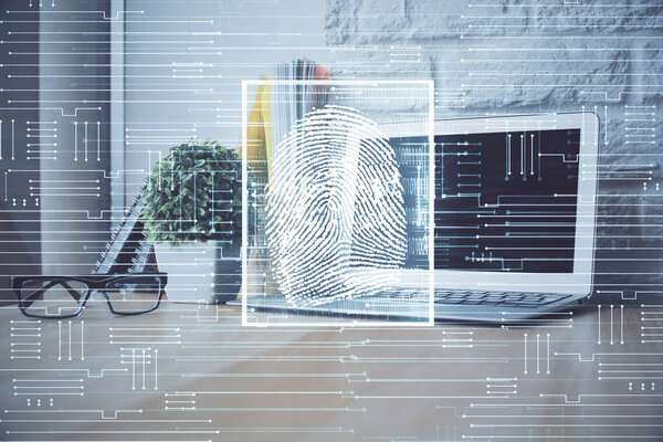 Computer on desktop in office with finger print drawing. Double exposure. Concept of business data security.