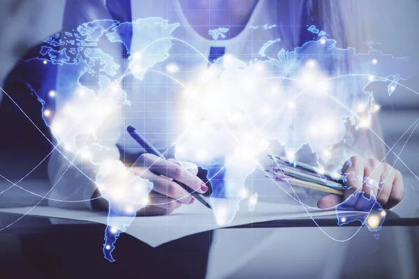 International business hologram over hands taking notes background. Concept of success. Multi exposure — Stock Photo, Image