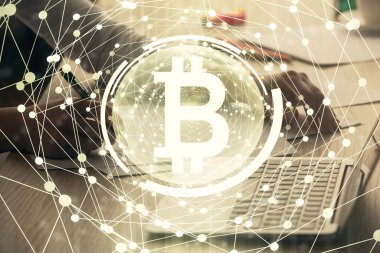 Bilgisayarda ve kripto piyasa temalı hologram çizimlerinde kadın elinin çifte pozu. Engelleme zinciri kavramı.