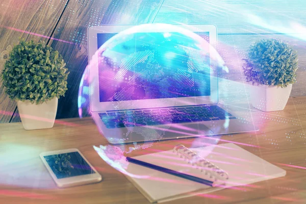 Computer on desktop in office with technology theme hologram. Multi exposure. Tech concept. — Stock Photo, Image