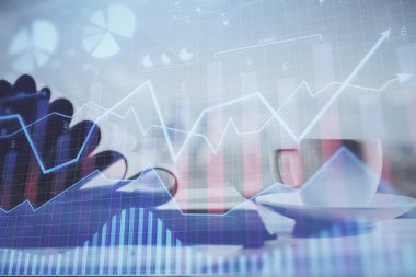 Finans şeması çizimine ve masaüstüne kahve ve masa arkasında eşyalar ile çifte pozlama. Önx piyasa ticareti kavramı