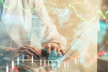 Bilgisayarda ve ön x grafik hologram çiziminde kadın eli yazarken çift pozlama. Borsa yatırım kavramı.