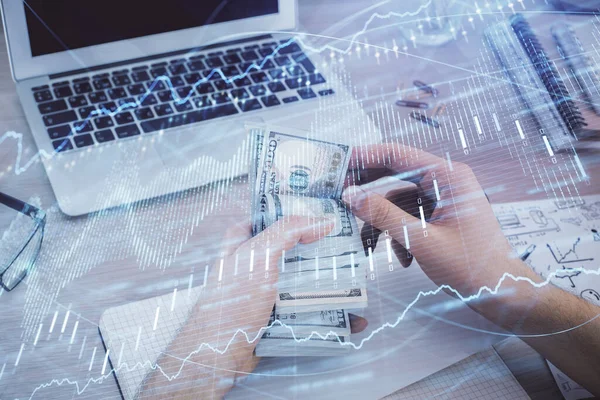 Multi exponering av finansiella diagram rita hologram och USA dollar räkningar och manshänder. Analyskoncept. — Stockfoto