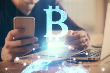 Erkeklerin el ele tutuşmalarının ve telefon ve kripto para birimi engelleme teması çiziminin iki kez görüntülenmesi.