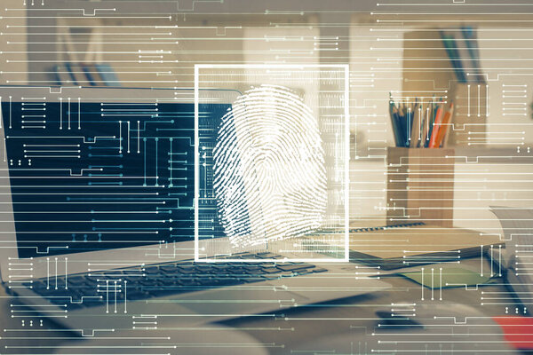Computer on desktop in office with finger print drawing. Double exposure. Concept of business data security.