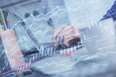 Bilgisayarda ve ön x grafik hologram çiziminde kadın eli yazarken çift pozlama. Borsa yatırım kavramı.