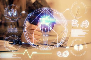 Multi exposure of woman on-line shopping holding a credit card and education theme drawing. E-learning concept.