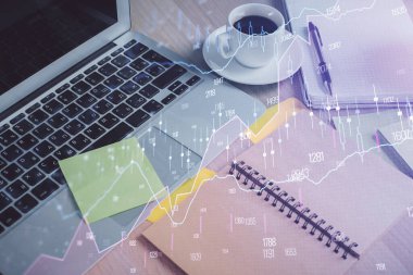 Önx grafik çizimi ve masaüstü ile kahve ve masa arkasındaki öğelerin çoklu pozlandırılması. Finansal piyasa ticareti kavramı