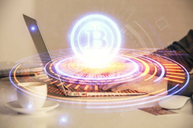 Bilgisayarda ve kripto piyasa temalı hologram çizimlerinde kadın elinin çifte pozu. Engelleme zinciri kavramı.