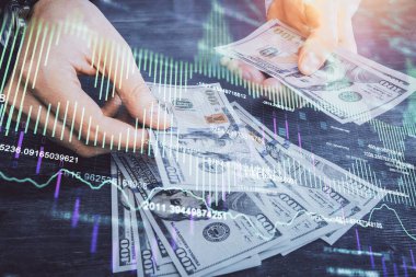 Finansal grafiğe çoklu pozlama hologram, Amerikan dolarları ve insan eli. Analiz kavramı.