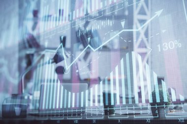 Borsa grafik çizimi ve ofis içi arka planının iki katına çıkarılması. Mali analiz kavramı.
