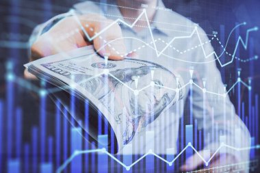 Finansal grafiğe çoklu pozlama hologram, Amerikan dolarları ve insan eli. Analiz kavramı.