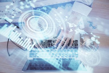 Arka planda dizüstü bilgisayarda çalışan iş adamlarının çoklu pozları. Uluslararası iş hologramı önde. Başarı kavramı.