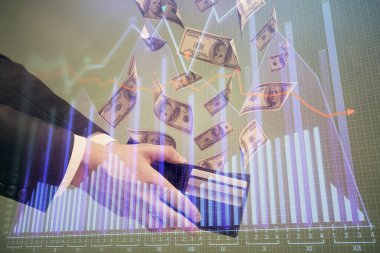 Finansal grafiğe çoklu pozlama hologram, Amerikan dolarları ve insan eli. Analiz kavramı.