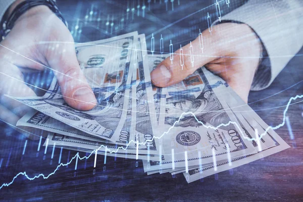 Multi exponering av finansiella diagram rita hologram och USA dollar räkningar och manshänder. Analyskoncept. — Stockfoto