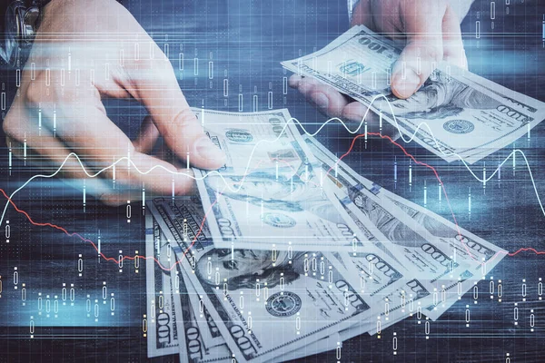 Multi eksponering av finansielle grafer trekke hologram og USA dollarsedler og mann hender. Analysemetode. – stockfoto