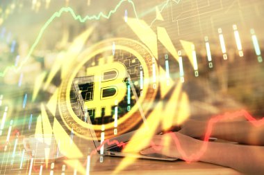 Bilgisayarda ve kripto piyasa temalı hologram çizimlerinde kadın elinin çifte pozu. Engelleme zinciri kavramı.