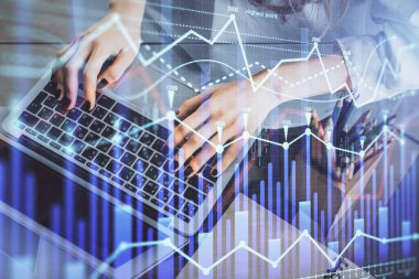 Bilgisayarda ve ön x grafik hologram çiziminde kadın eli yazarken çift pozlama. Borsa yatırım kavramı.