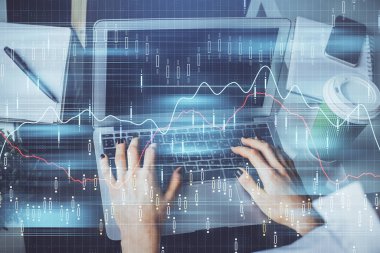 Bilgisayarda ve ön x grafik hologram çiziminde kadın eli yazarken çift pozlama. Borsa yatırım kavramı.