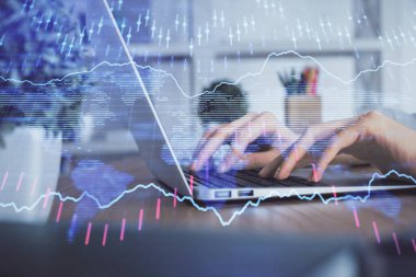 Bilgisayarda ve ön x grafik hologram çiziminde kadın eli yazarken çift pozlama. Borsa yatırım kavramı.