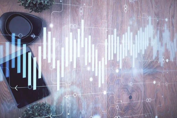 Multi exposición de holograma gráfico financiero sobre el escritorio con el teléfono. Vista superior. Concepto de plataforma de comercio móvil. — Foto de Stock