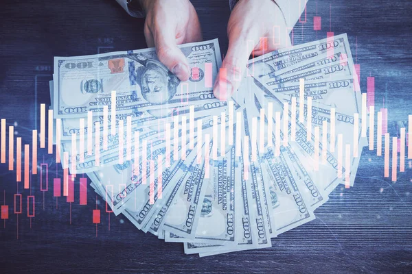 Multi exponering av finansiella diagram rita hologram och USA dollar räkningar och manshänder. Analyskoncept. — Stockfoto