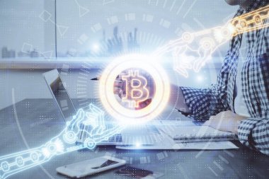 Arka planda bilgisayarla çalışan bir adamla engelleme temalı Hud. Kripto zinciri kavramı. Çift pozlama.