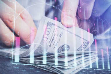 Forx grafiği, hologram, Amerikan dolarları ve insan eli çizimleri. Teknik Analiz kavramı.