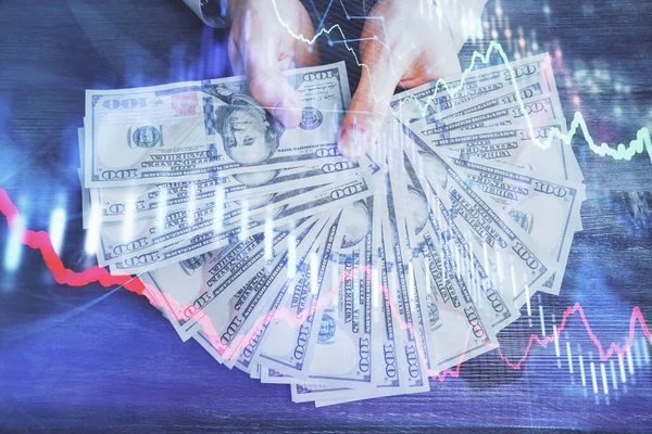 Multi exposição do holograma de desenho gráfico financeiro e contas de dólares dos EUA e mãos de homem. Conceito de análise . — Fotografia de Stock