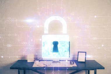 Bilgisayar ve ikon hologramı ile masaüstüne çift pozlama. Veri güvenliği kavramı.