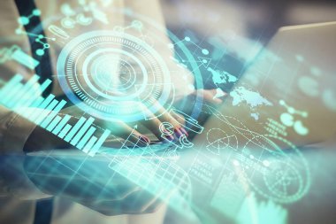 Kadın elinin bilgisayar ve iş temalı hologram çizimlerinde çok fazla pozlanması. Başarı konsepti.