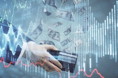 Finansal grafiğe çoklu pozlama hologram, Amerikan dolarları ve insan eli. Analiz kavramı.