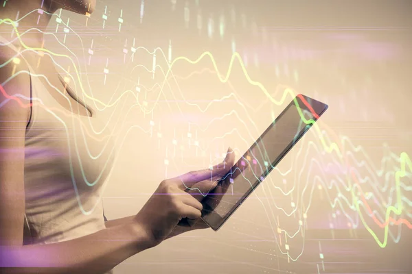 Double exposure of forex chart sketch hologram and woman holding and using a mobile device. Financial market concept.