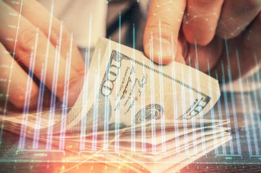 Forx grafiği, hologram, Amerikan dolarları ve insan eli çizimleri. Teknik Analiz kavramı.