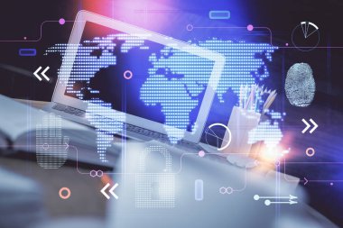 Bilgisayar ve dünya haritası hologramıyla masaüstü çifte pozlama. Uluslararası veri ağı kavramı.